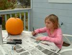 10 Carla sketching the face of her jack-o-lantern in preparation for Halloween