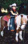 25 Amaia on the pony at preschool (photo courtesy of school photographer)